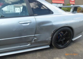 1999 Nissan GT-R Vspec side damage